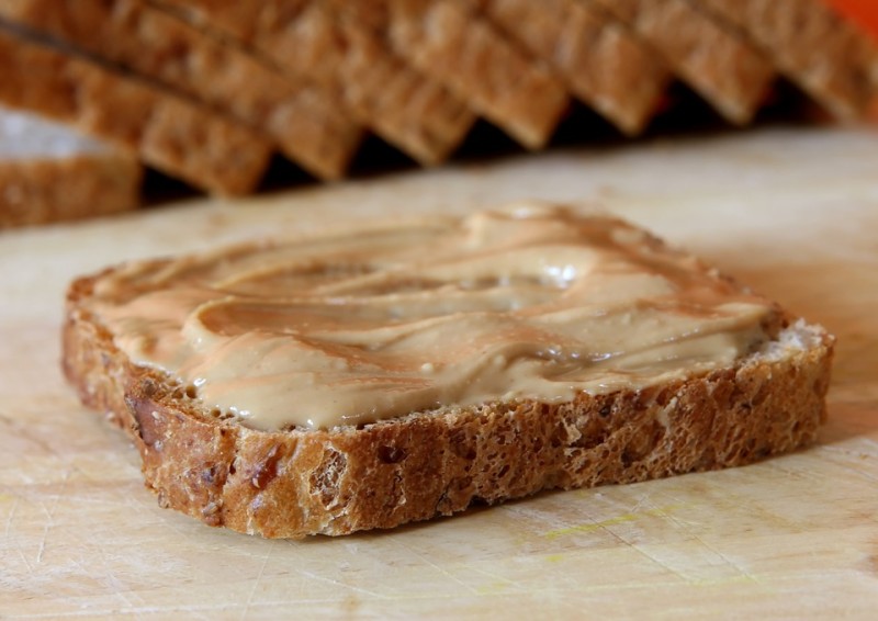 Peanut butter on a slice of bread